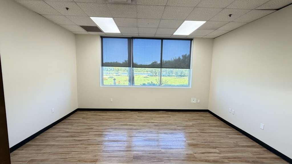 Completed room, painted with new flooring installed